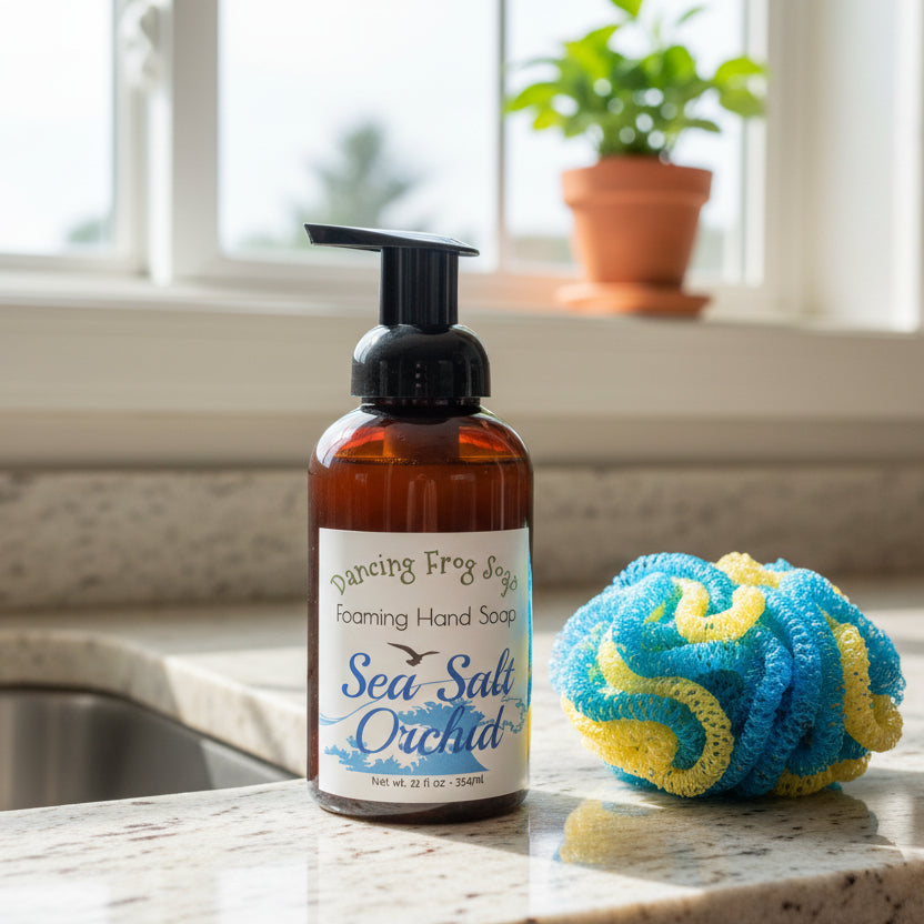 Bottle of 'Sea Salt Orchid' foaming hand soap against a brick wall.