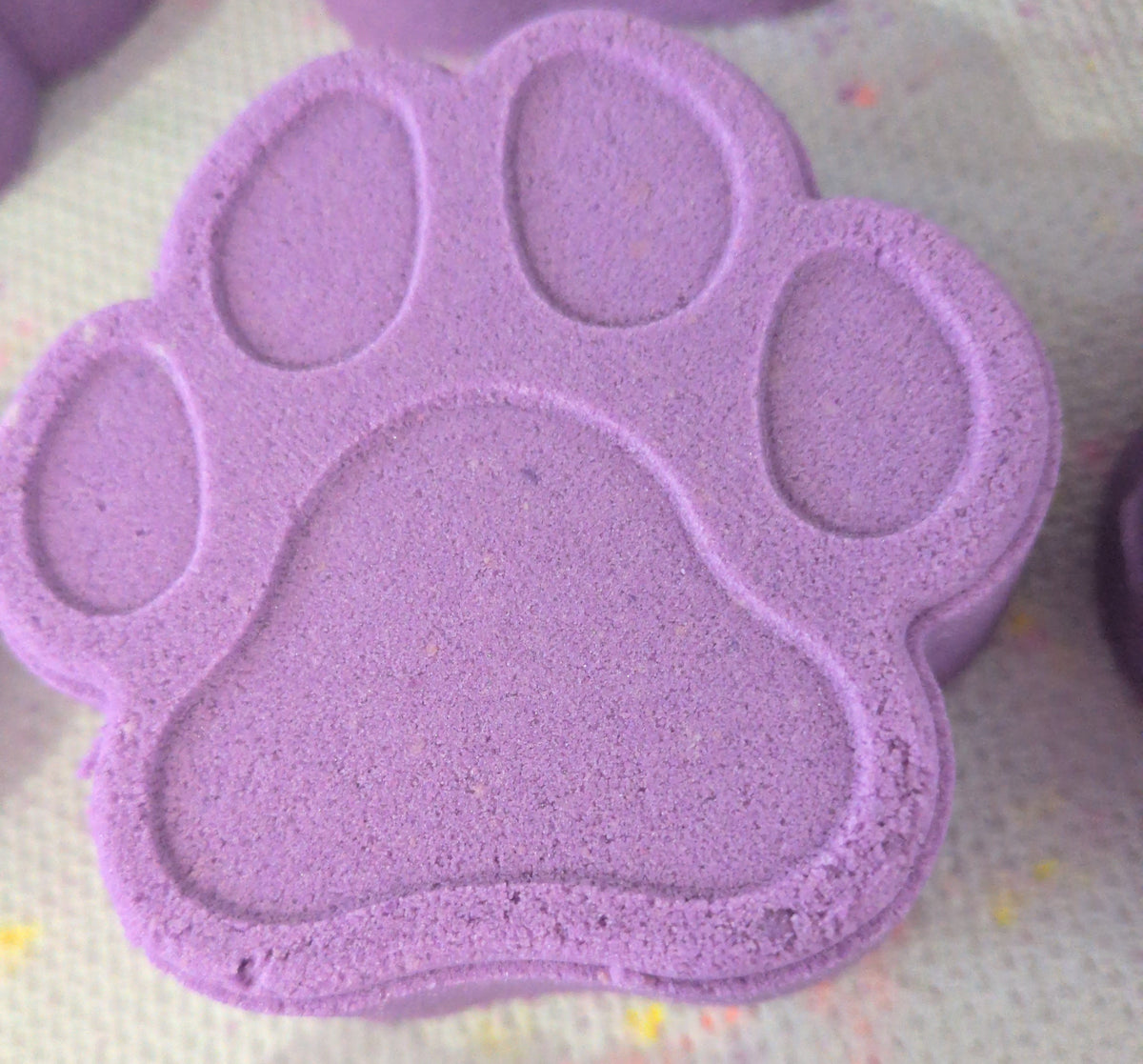 Purple paw print bath bomb